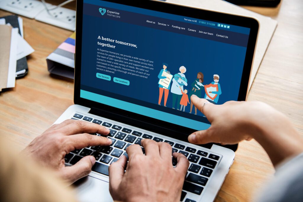 People using the Expertise Homecare website on a laptop