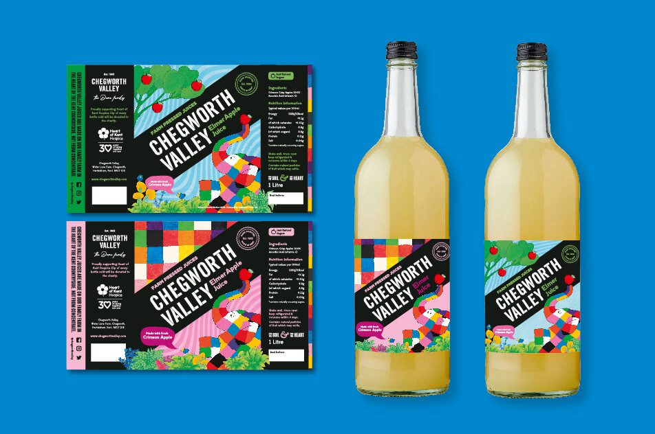 Chegworth Valley Elmer Apple Juice packaging with colourful Elmer elephant design, Heart of Kent Hospice charity partnership, and bottled juice on a blue background.
