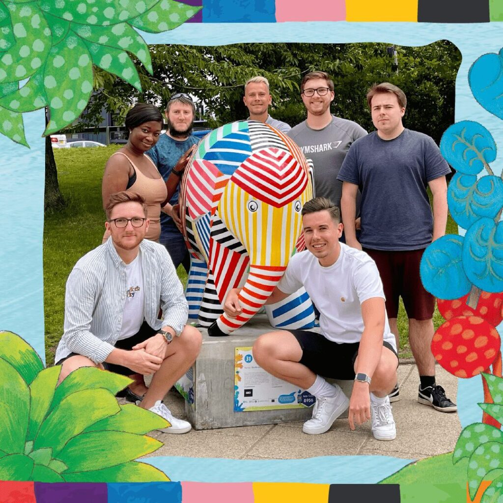 GeoBrand team pictured with a colourful Elmer elephant sculpture supporting the Heart of Kent Hospice partnership.