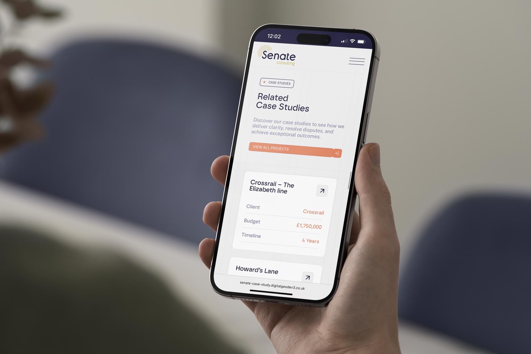 Close-up of Senate Consulting’s website on mobile, showcasing the case study section with a clean layout and vibrant orange button inviting users to explore past work.