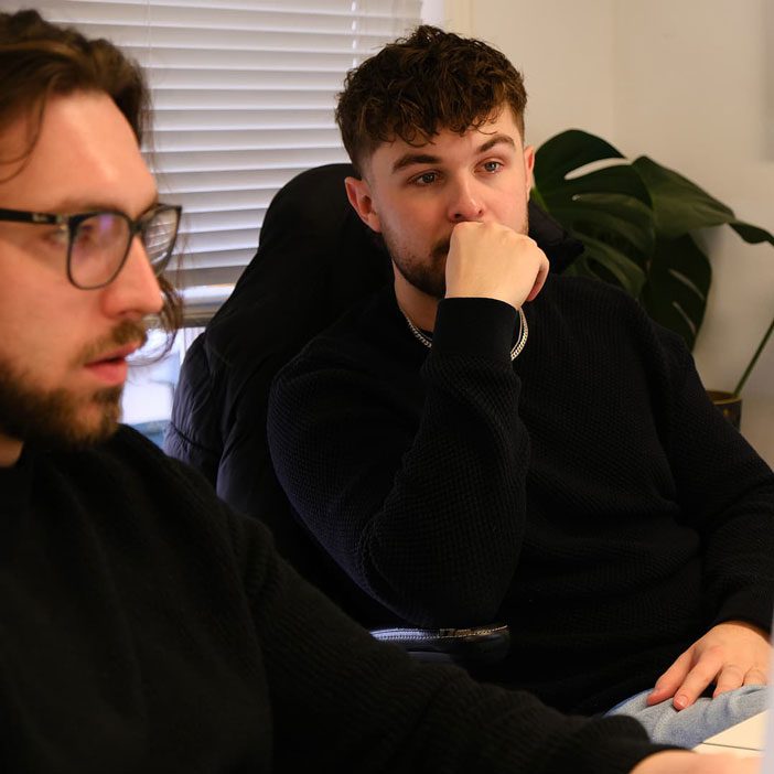 Designers collaborating on website design and conversion rate optimisation strategy