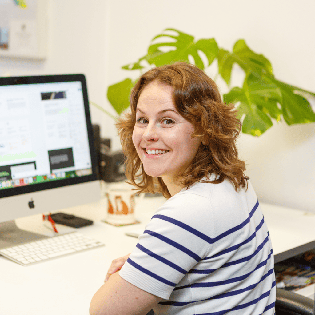 web designer working on website design at desk